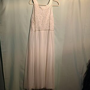 White Sleeveless Formal Gown with Sequin Bodice and Flowing Chiffon Skirt